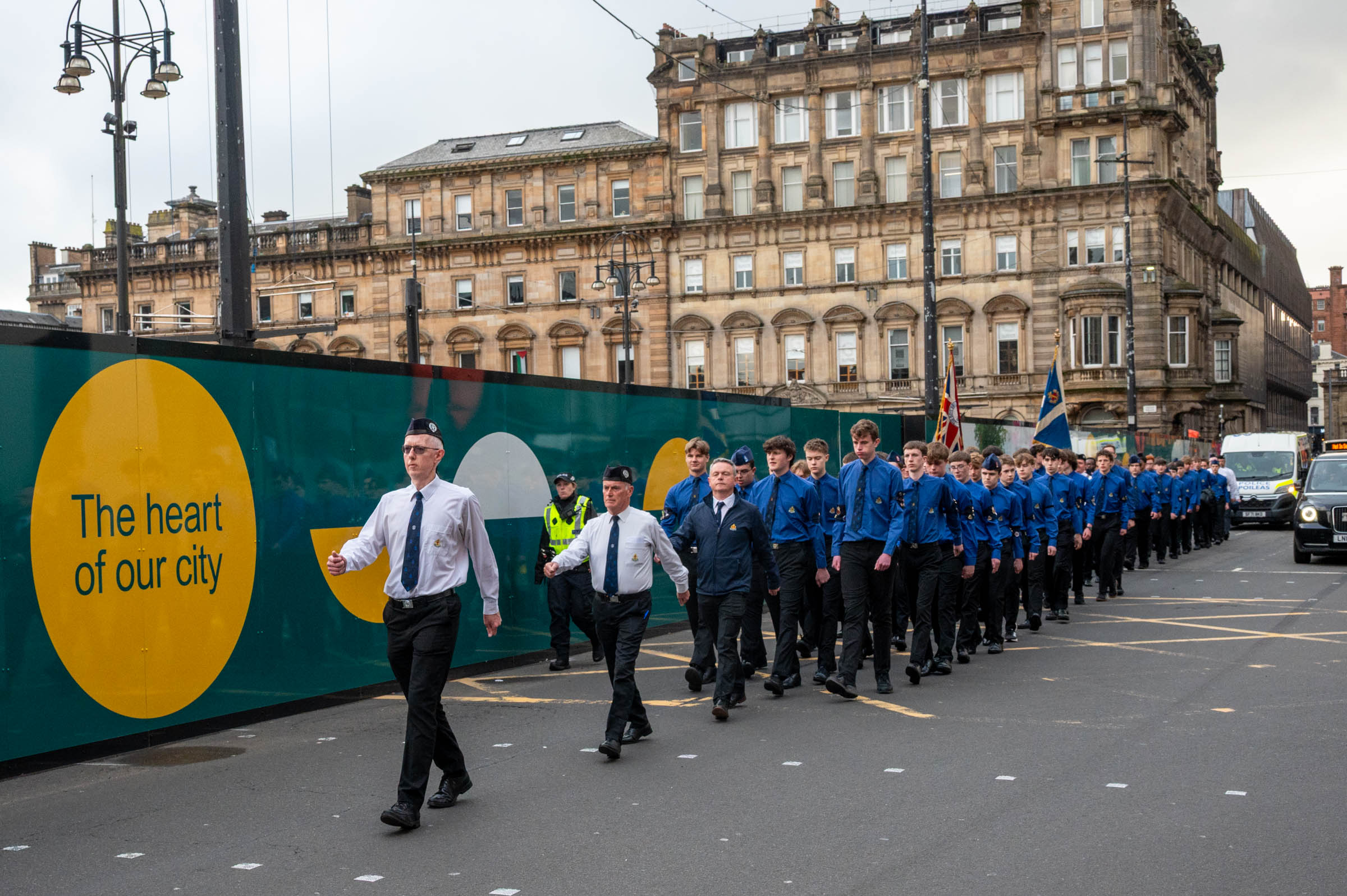 The parade marching along the north side of George Square en route to Glasgow City Chambers