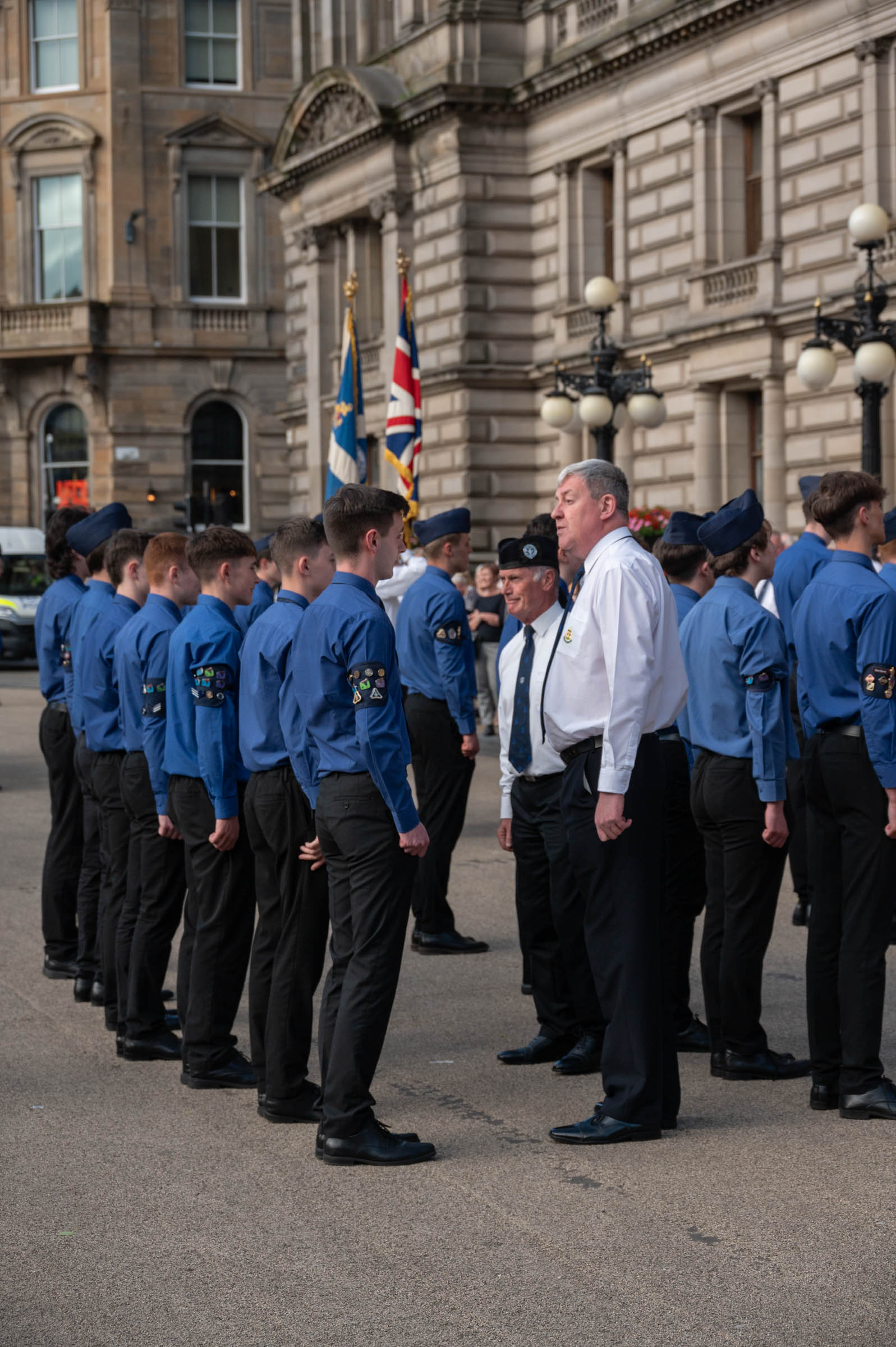 Alan Hunter talks to the Queen's Men as he inspects them outside Glasgow City Chambers